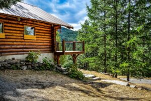 rustic cabin home overlooking mountains and trees