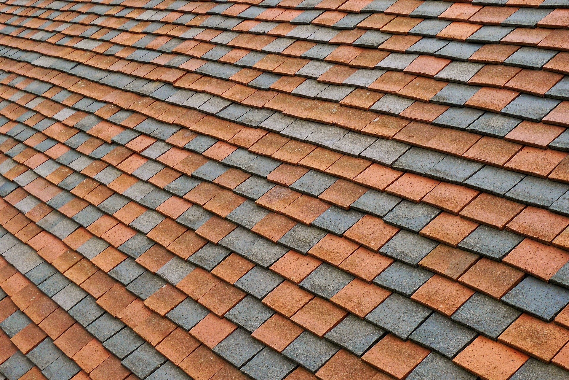 shingles on a roof that's been patched